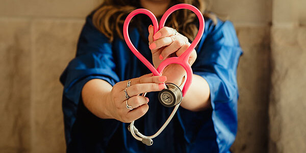 nurse with heart shaped stethoscope